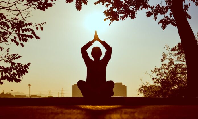 Women Doing yoga in the morning